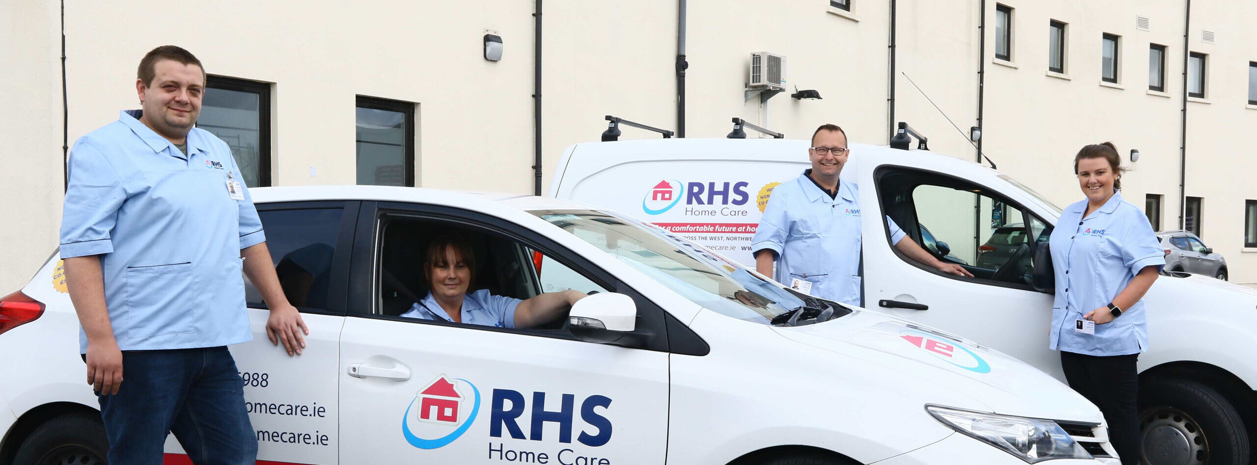 Care Assistants standing by RHS Car